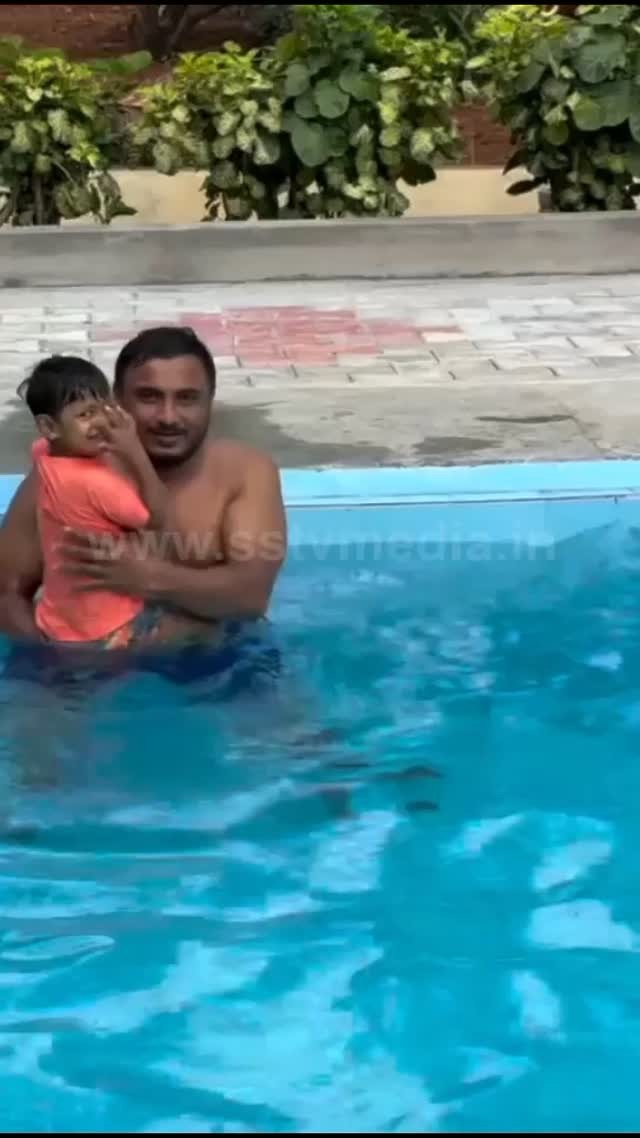 Amulya swimming with the children