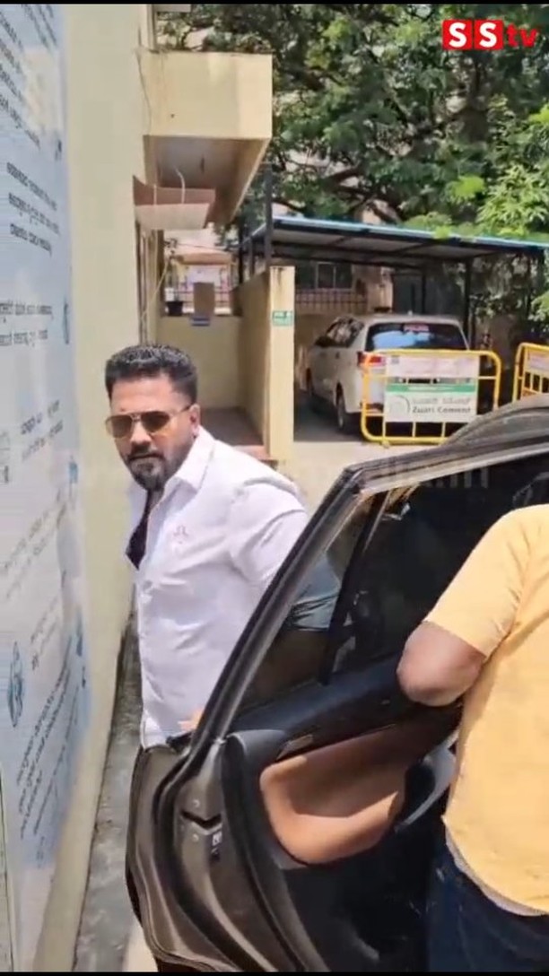 Rajat arrives at the police station for questioning