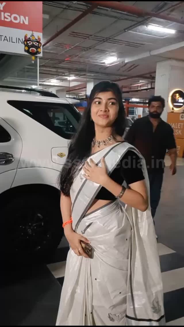 Prem's daughter looks cute in a saree with her parents