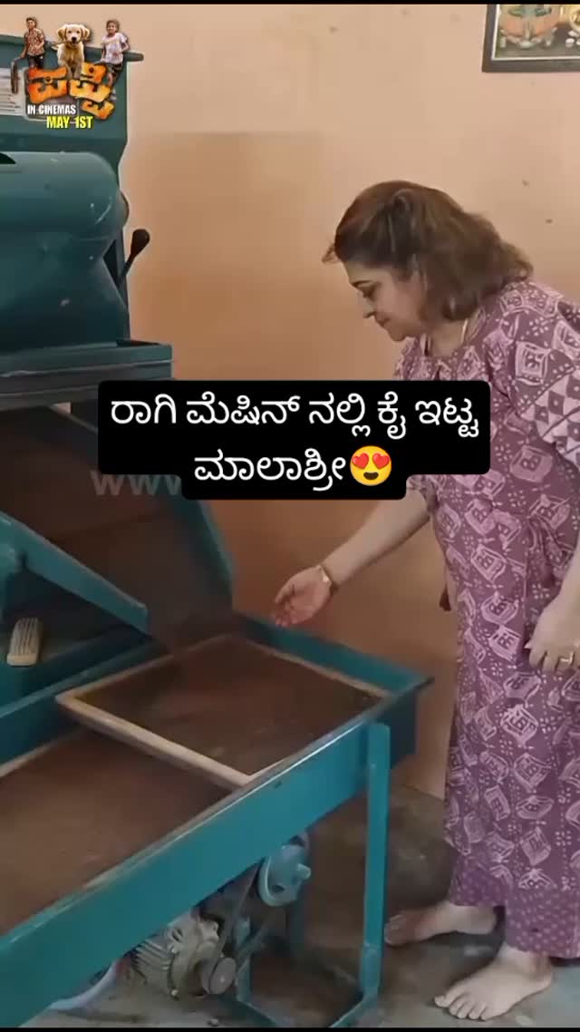 Malashree puts her hand in the ragi machine