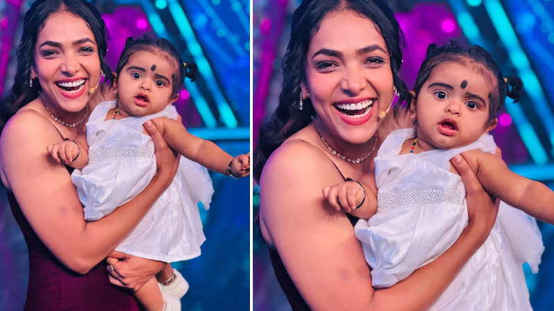 Whose child is Anupama Gowda's hand