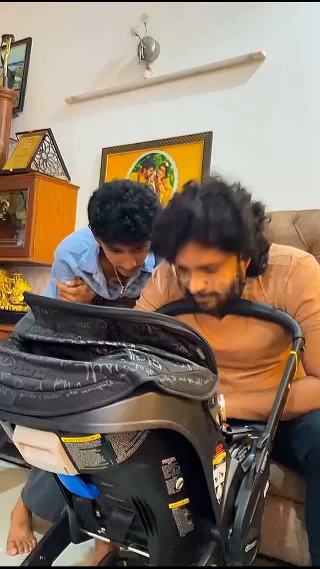 Vasishta Simha playing with a cute baby